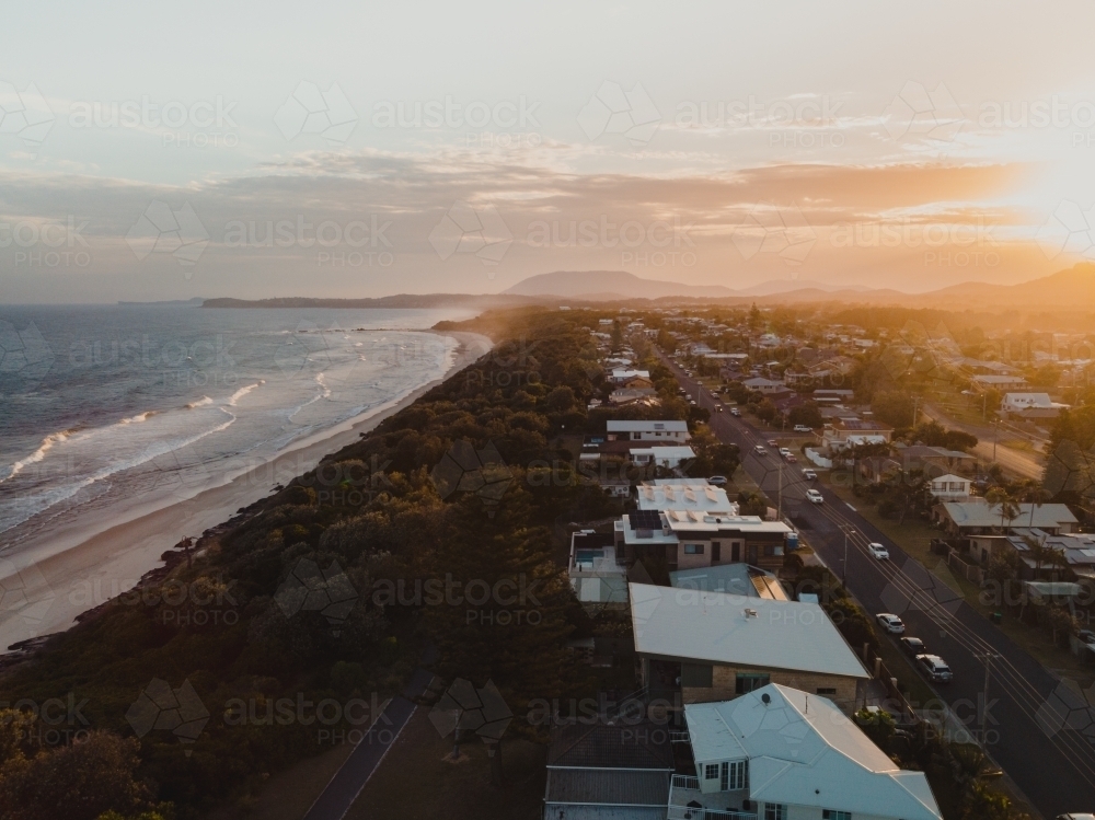 Sunset over the beachfront properties at Lake Cathie - Australian Stock Image