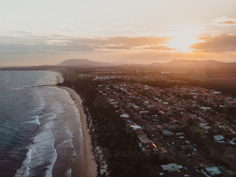Sunset over the beachfront properties at Lake Cathie - Australian Stock Image