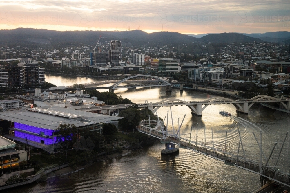 Sunset over the Brisbane River looking towards Mt Coot-tha at dusk - Australian Stock Image