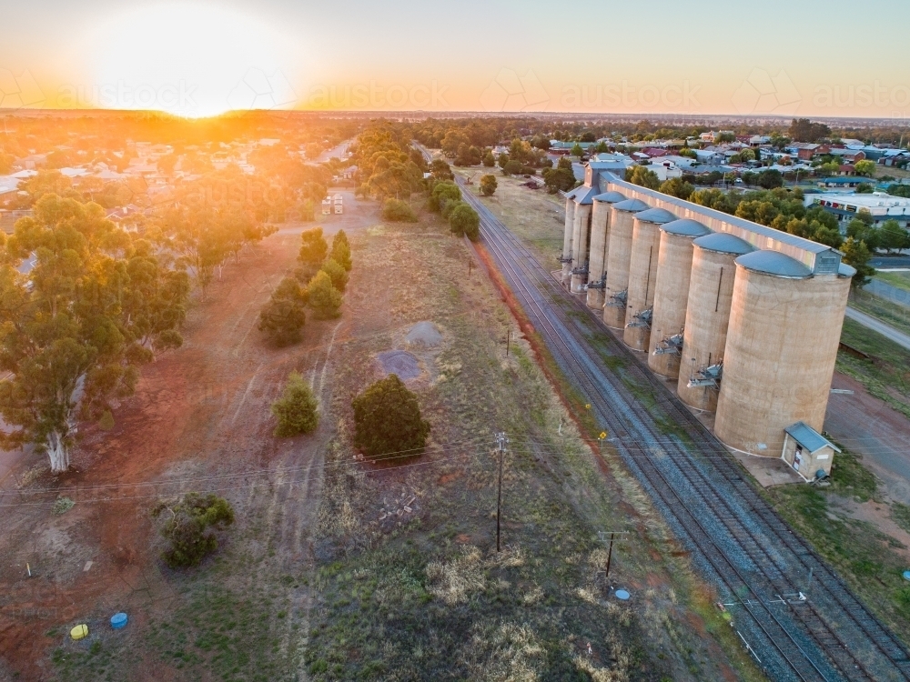 Sunset over wheat silos at Coolamon - Australian Stock Image