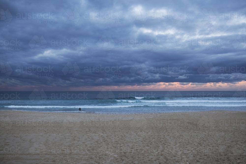 Sunset storm at beach - Australian Stock Image