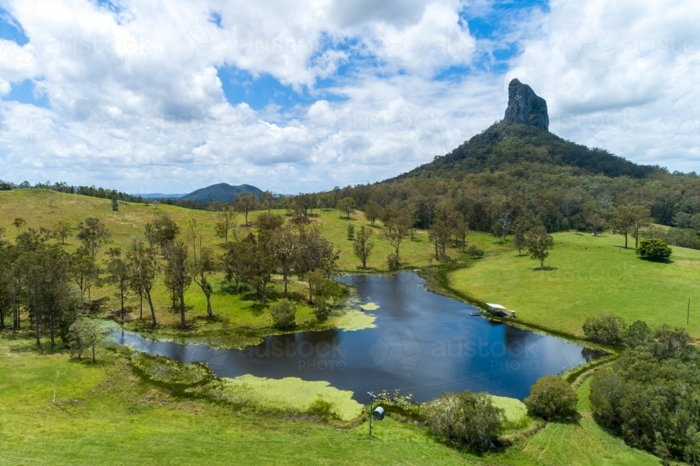 Sunshine Coast rural vista with lake and Mount Coonowrin. - Australian Stock Image