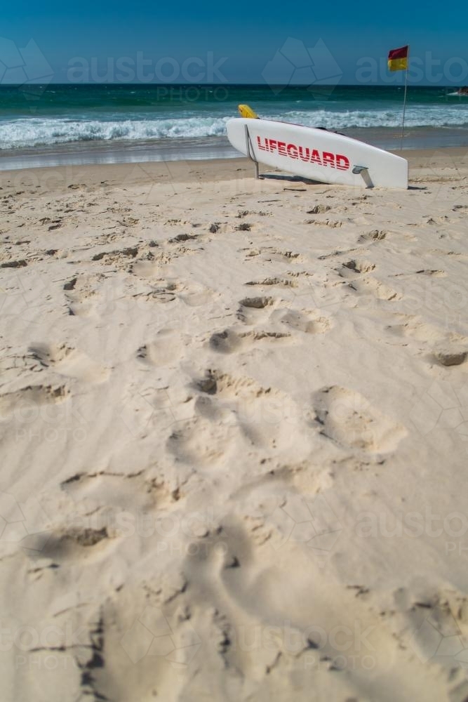 Surf Lifeguard on beach - Australian Stock Image