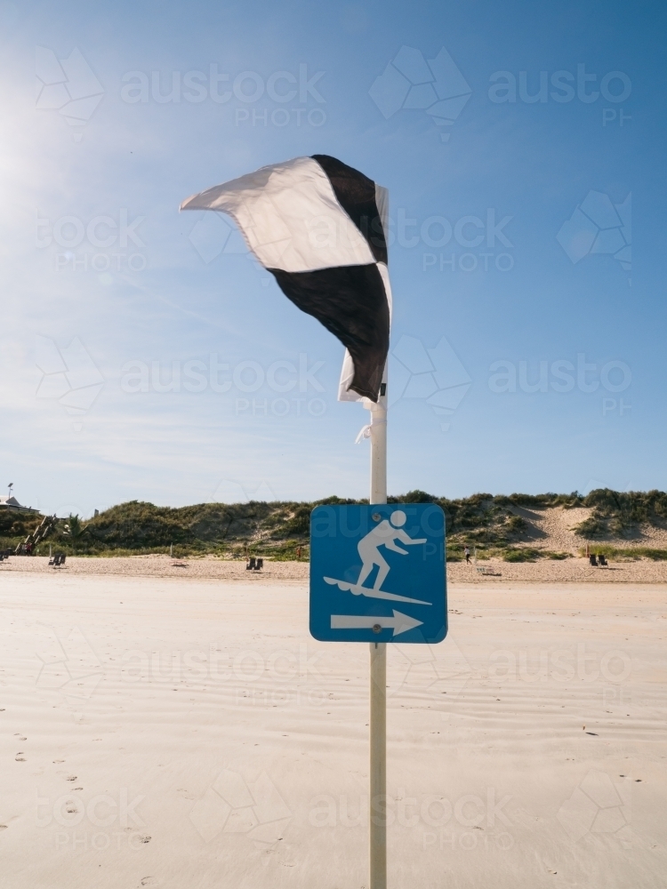 Surf Lifesaving Flag and Sign Indicating where to Surf - Australian Stock Image