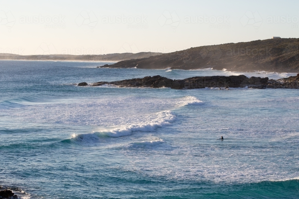 Surf rolling in at Native Dog Beach - Australian Stock Image