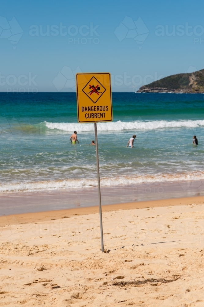 surf sign reading dangerous current - Australian Stock Image