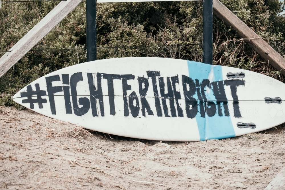 Surfboard protest sign - Australian Stock Image