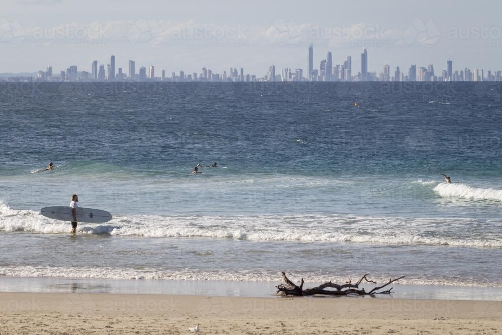 Surfer at Rainbow Bay - Australian Stock Image