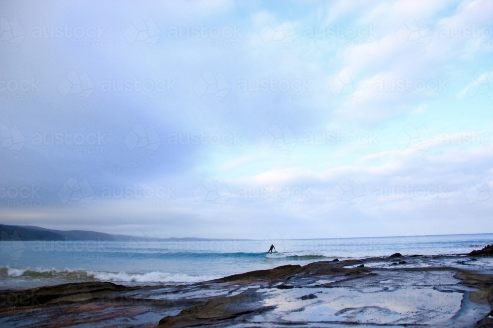 Surfer Enjoying the Lonely Sunset - Australian Stock Image