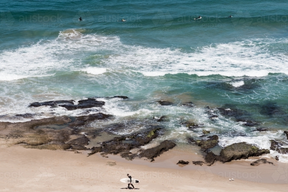 surfers out to sea - Australian Stock Image