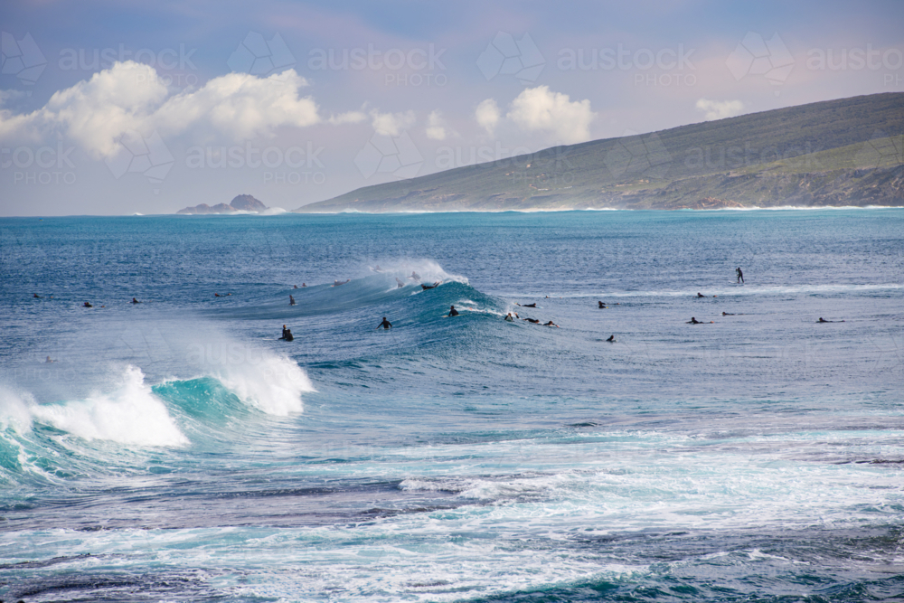 Surfers waiting on waves in Yallingup - Australian Stock Image