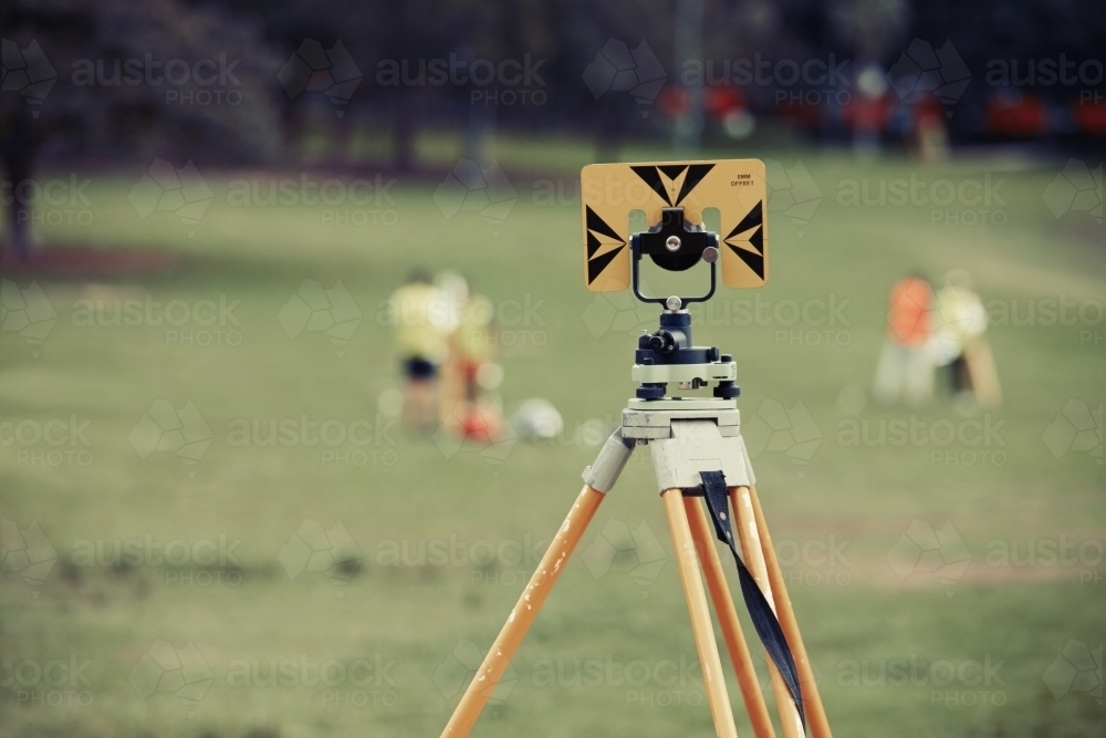 Survey equipment being used outdoors - Australian Stock Image