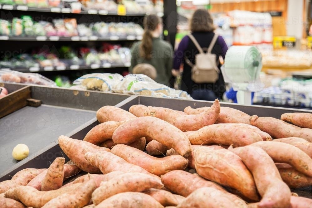 Sweet potatoes in the grocery store - Australian Stock Image