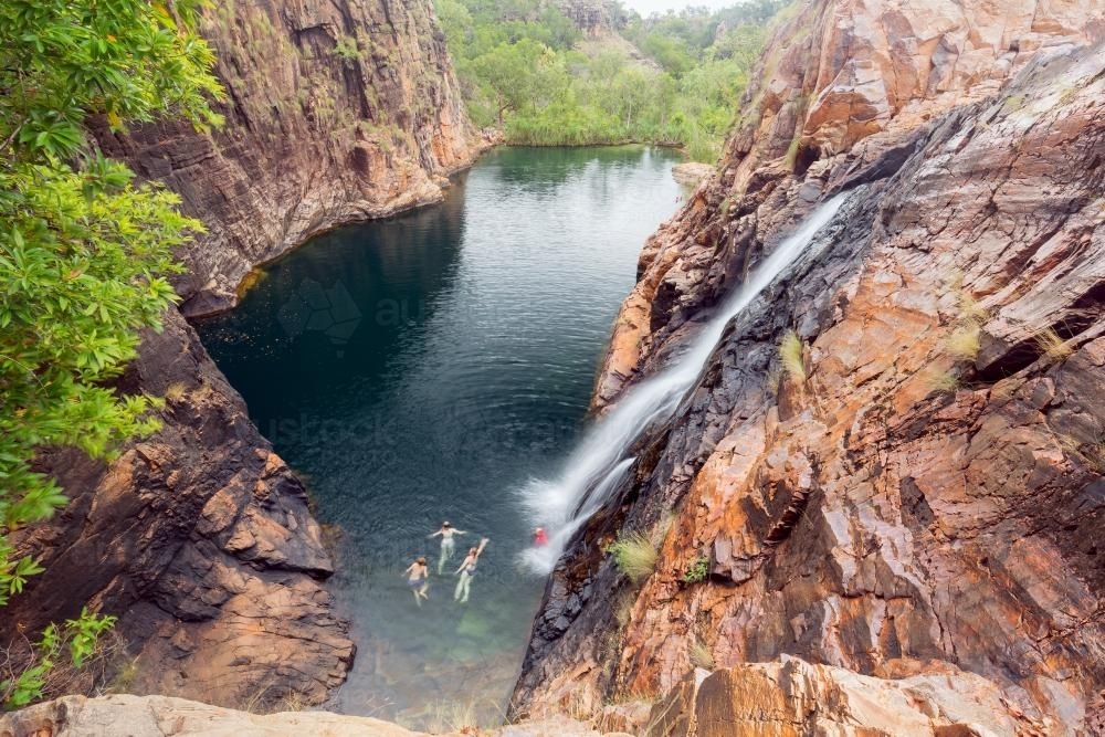 Swimming in Maguk Waterfall, Kakadu National Park - Australian Stock Image