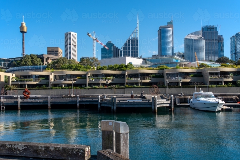 Sydney city skyline with harbour and boat in the foreground - Australian Stock Image