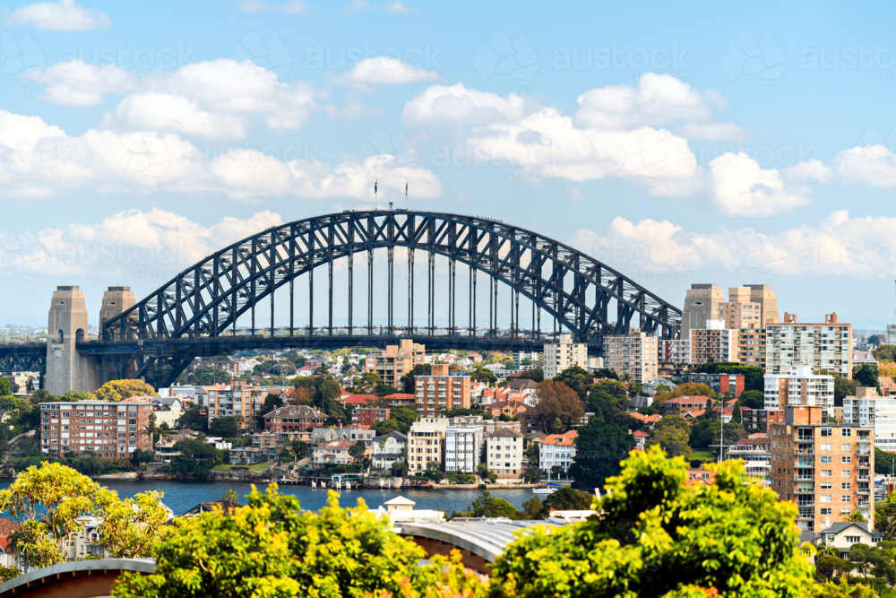 Sydney Harbour Bridge among Sydney North residential buildings in the background viewed from Bradley - Australian Stock Image