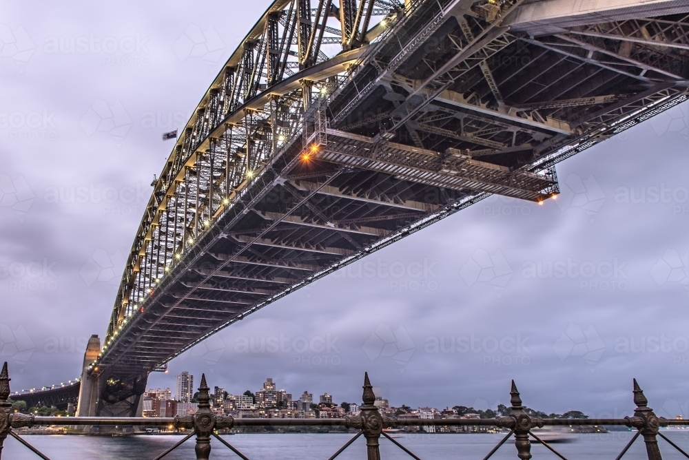 Sydney Harbour Bridge at dusk from below - Australian Stock Image