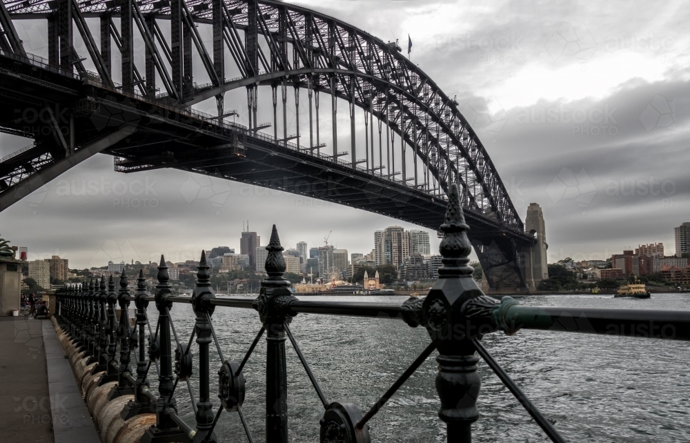 Sydney Harbour Bridge from the foreshore on an overcast morning - Australian Stock Image