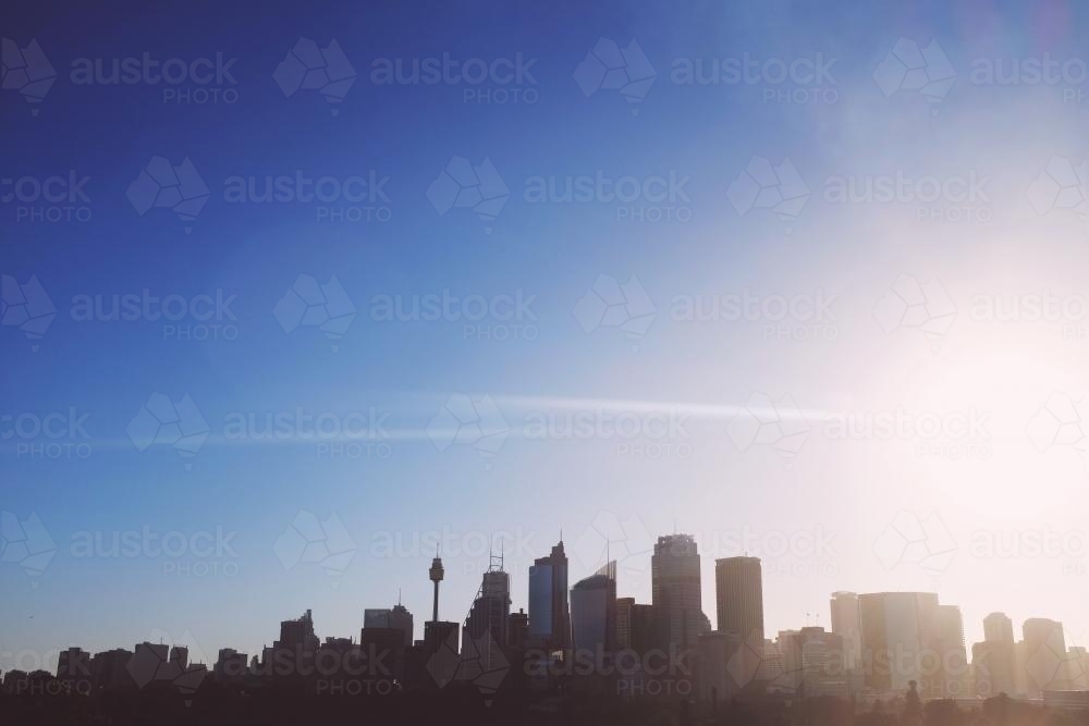 Sydney skyline with sun flare - Australian Stock Image