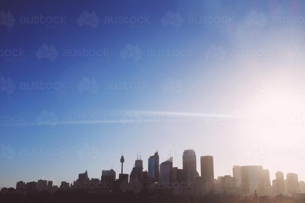 Sydney skyline with sun flare - Australian Stock Image