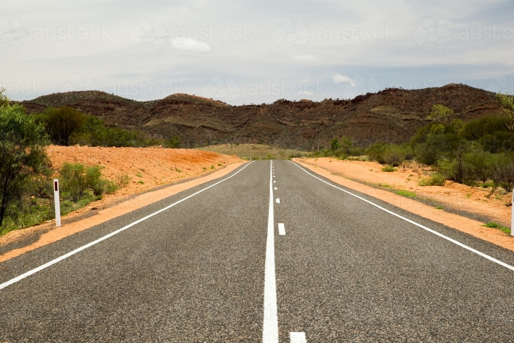 Symmetrical view of rural road - Australian Stock Image