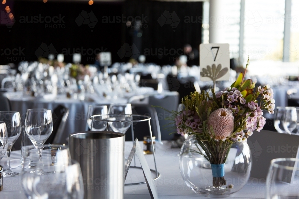 Table set for a dinner at a function centre - Australian Stock Image