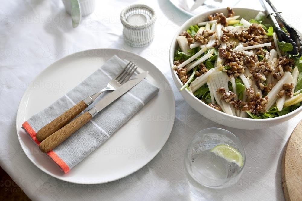 Table setting for lunch with salad - Australian Stock Image