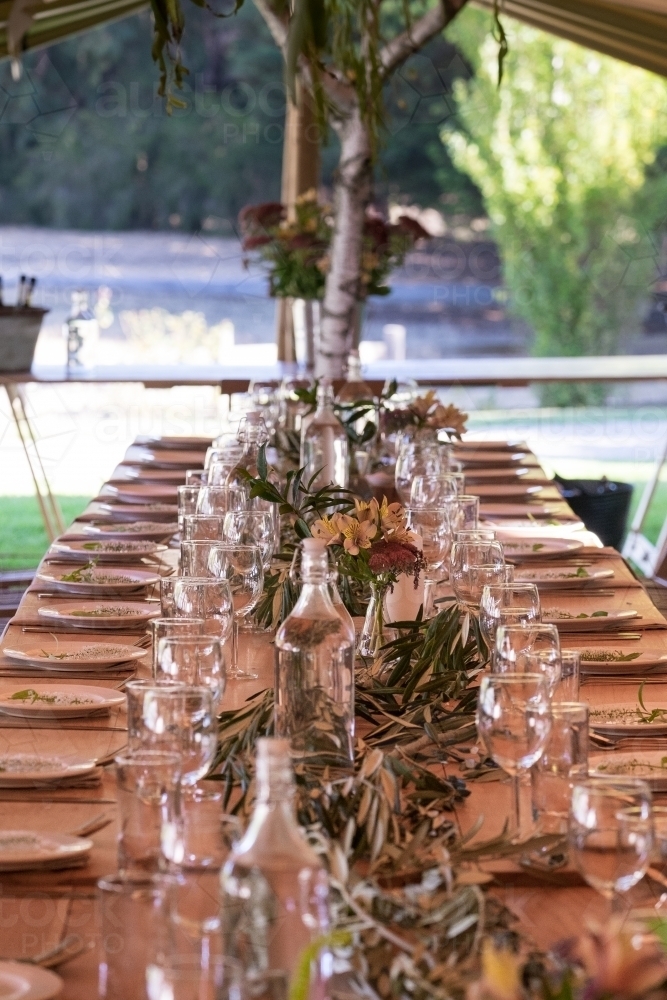 Table setting inside a wedding marquee - Australian Stock Image