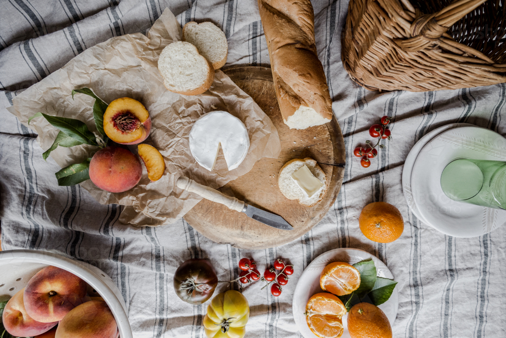 tablescape of a cheese and other picnic foods - Australian Stock Image