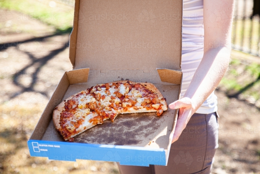 Takeaway pizza for a easy meal - Australian Stock Image