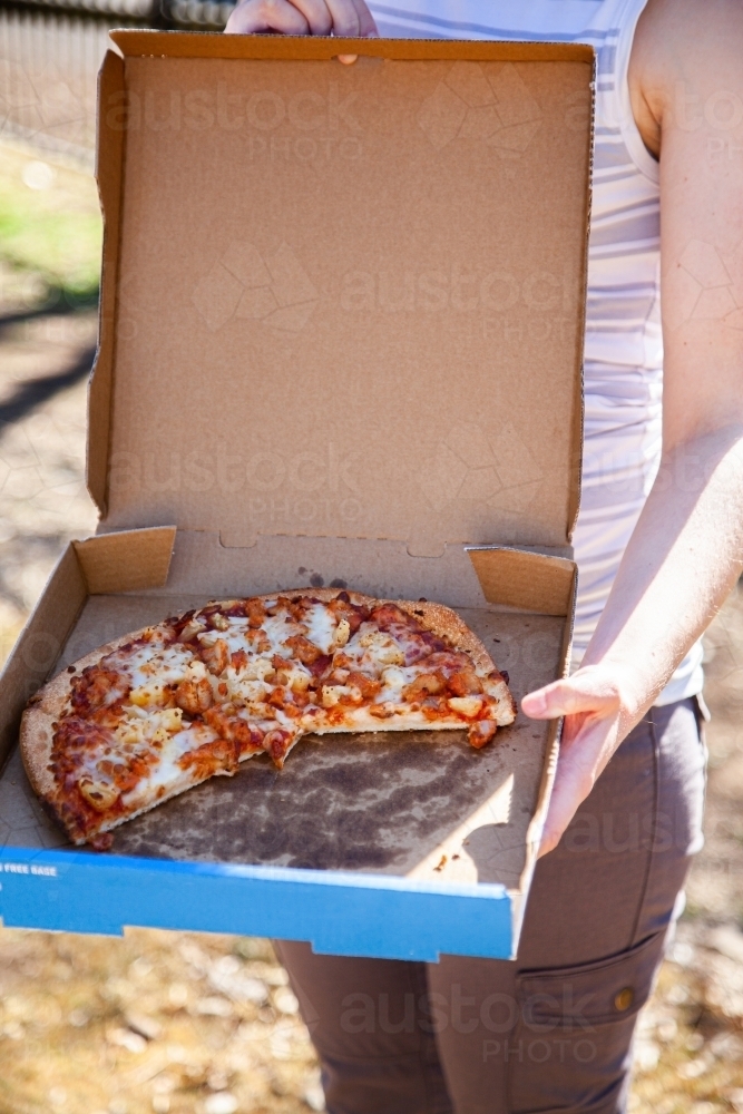 Takeaway pizza for an easy meal - Australian Stock Image