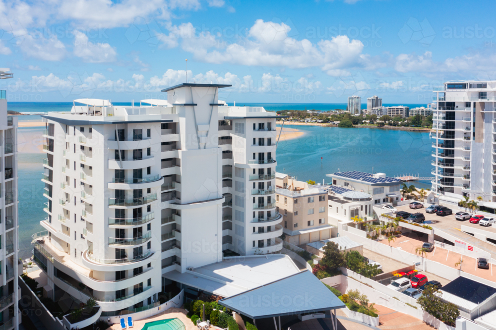 tall apartment buildings in a coastal town - Australian Stock Image