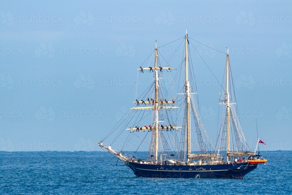 Tall Ship STS Leeuwin II motoring at sea. - Australian Stock Image