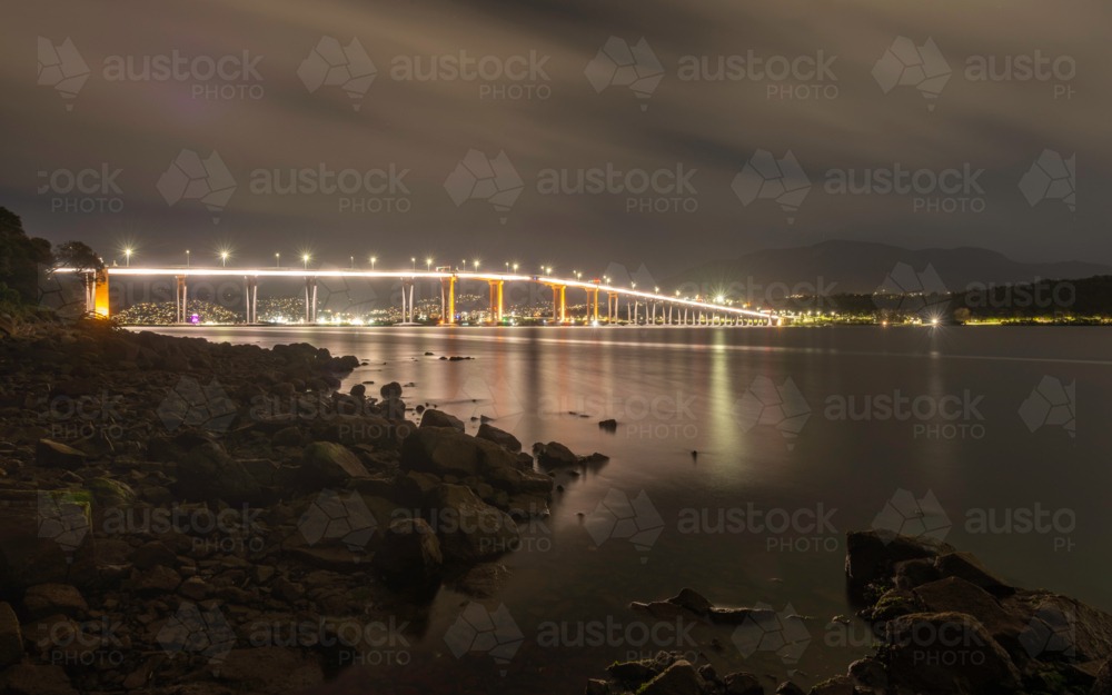 Tasman Bridge light up at night with Mount Wellington in the background - Australian Stock Image