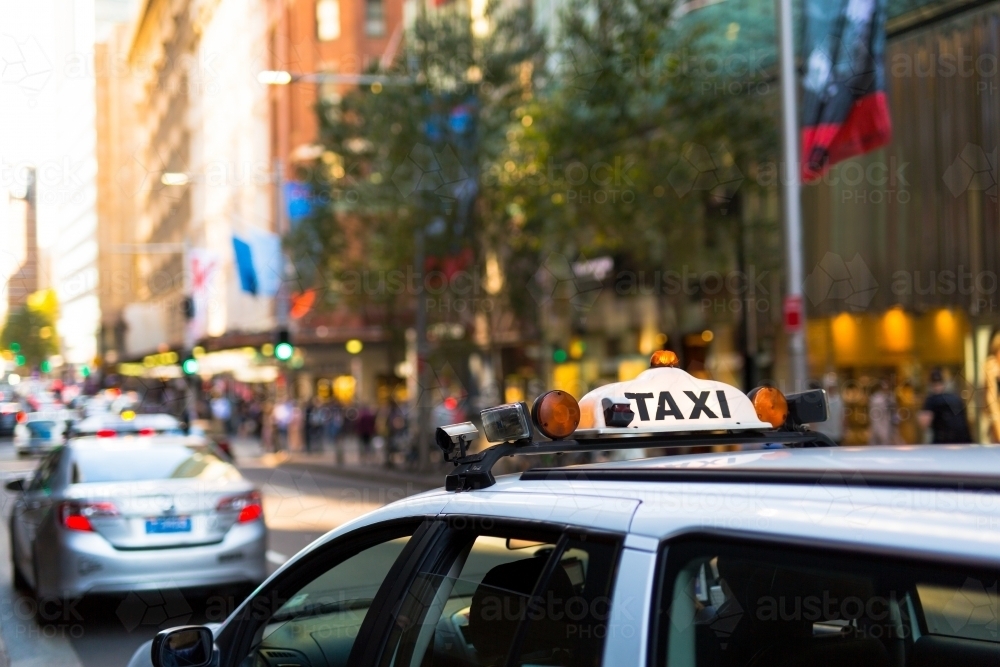 taxi sign in central sydney - Australian Stock Image
