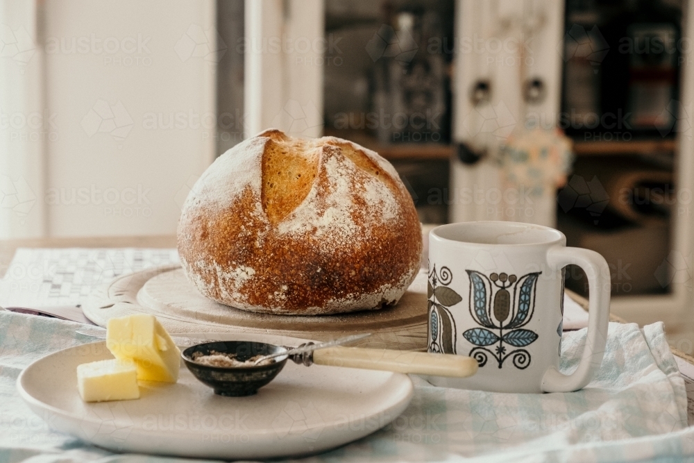 Tea and bread ready to eat. - Australian Stock Image