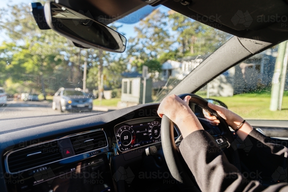 teen driving to school - Australian Stock Image