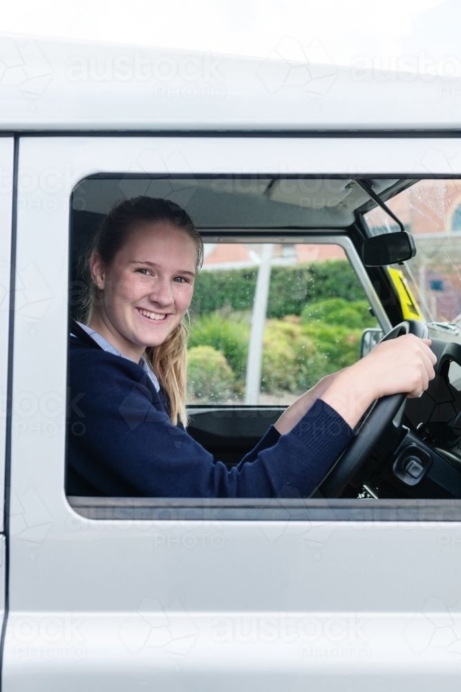 teen learner driver at the wheel of a car - Australian Stock Image