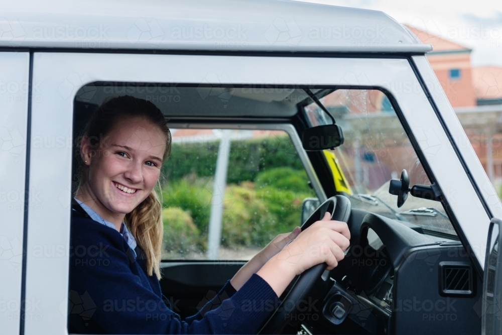 teen learner driver at the wheel of a car - Australian Stock Image