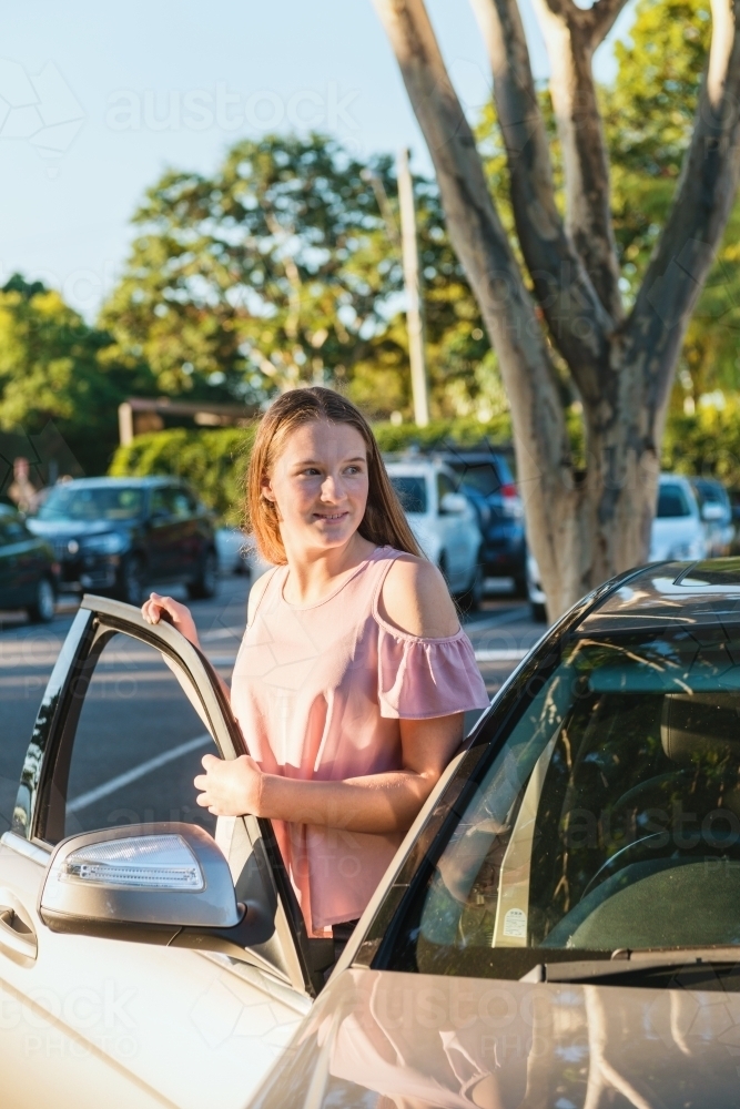 teen learner driver with car - Australian Stock Image
