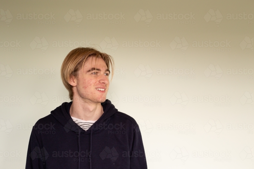 Teenage boy headshot looking to the right - Australian Stock Image