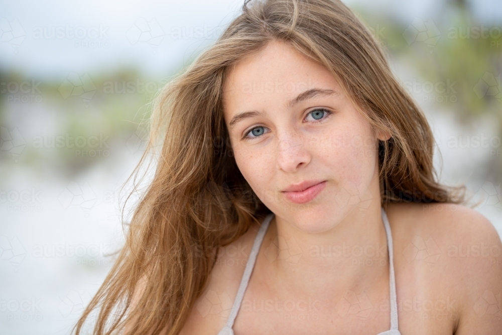 teenage girl with long hair head and shoulders - Australian Stock Image