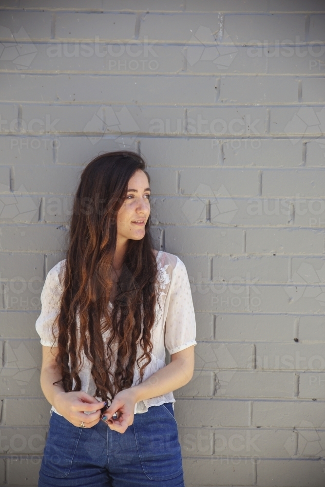 multiculural teenage girl with very long hair - Australian Stock Image