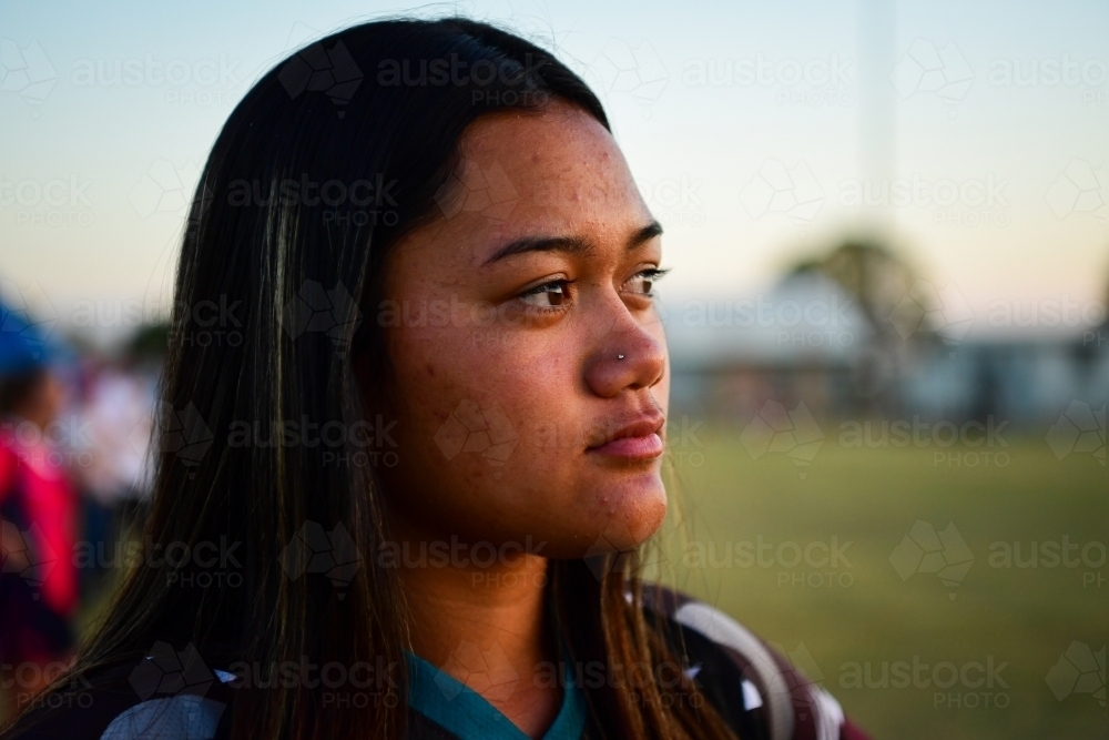 Teenage Maori girl at sporting contest - Australian Stock Image