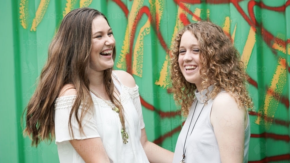 Teenager girls laughing - Australian Stock Image