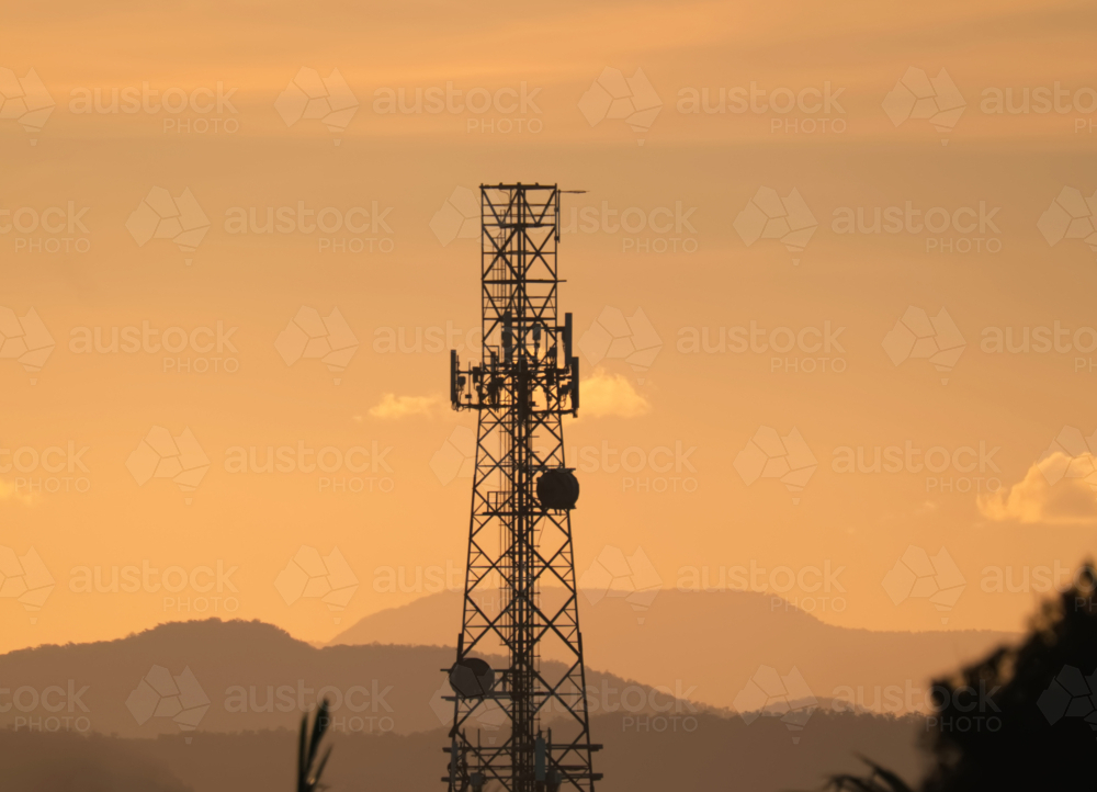 Telecommunications tower at sunset - Australian Stock Image