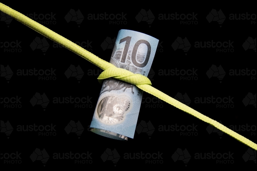 Ten Dollars Tied in a Knot - Australian Stock Image