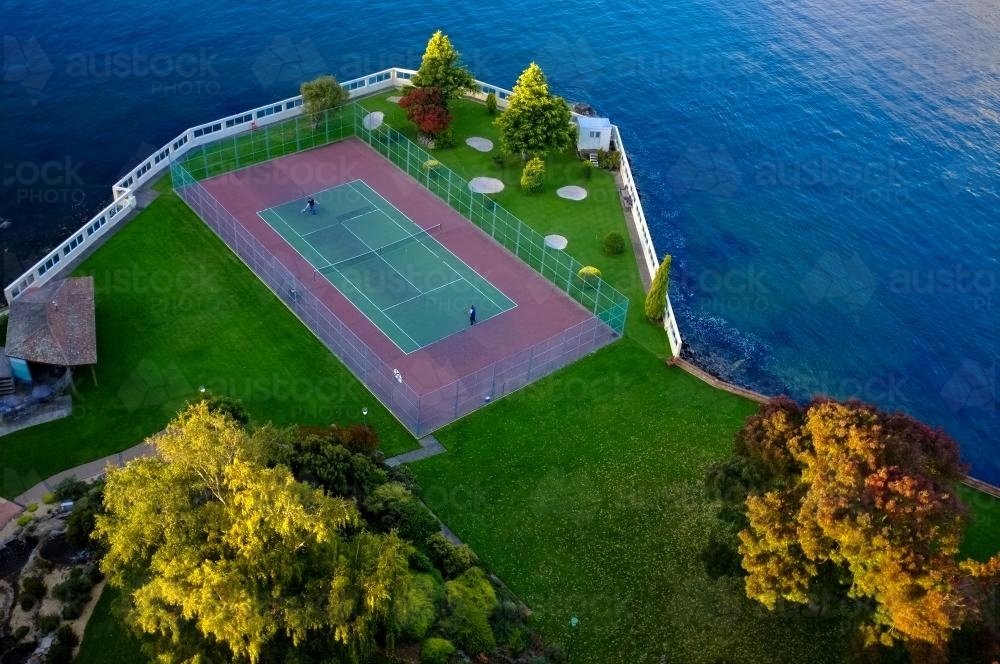 Tennis by the sea - Australian Stock Image