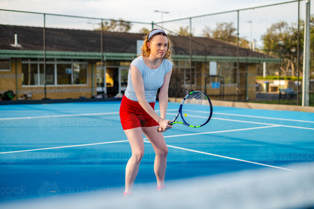 Tennis player at the net prepared for a tennis game - Australian Stock Image