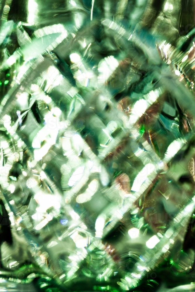Texture of light in sparkling bright green patterns - Australian Stock Image